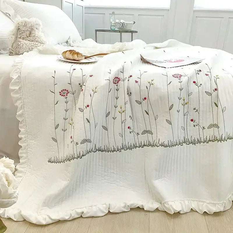 White fresh flower embroidered quilt set with delicate pink red and gray floral embroidery on ruffled cotton edge