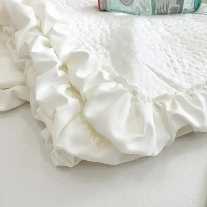 White fresh flower embroidered quilt set with ruffled quilted cotton bedsheet and gathered elastic edge by decorbites fresh flower