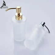 White frosted glass liquid soap dispenser with gold pump for bathroom use and elegant liquid soap dispensing