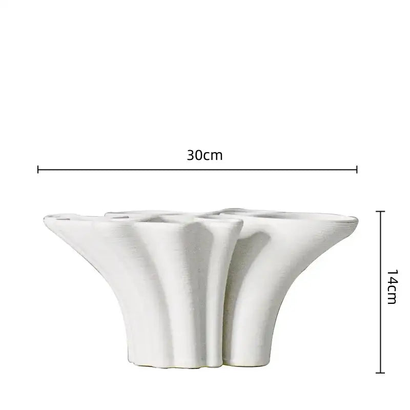 White geometric ceramic fold pattern flower shaped planter with fluted sides for decorbites geometric ceramic decor