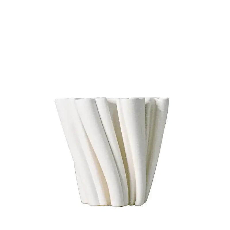 A sleek white geometric ceramic fold pattern vase with flowing vertical ridges for modern living room decorbites decor
