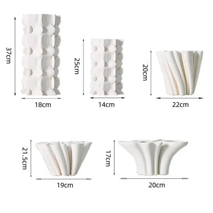 White geometric ceramic fold pattern vase set with textured surfaces in varying heights for living room decorbites geometric ceramic decor