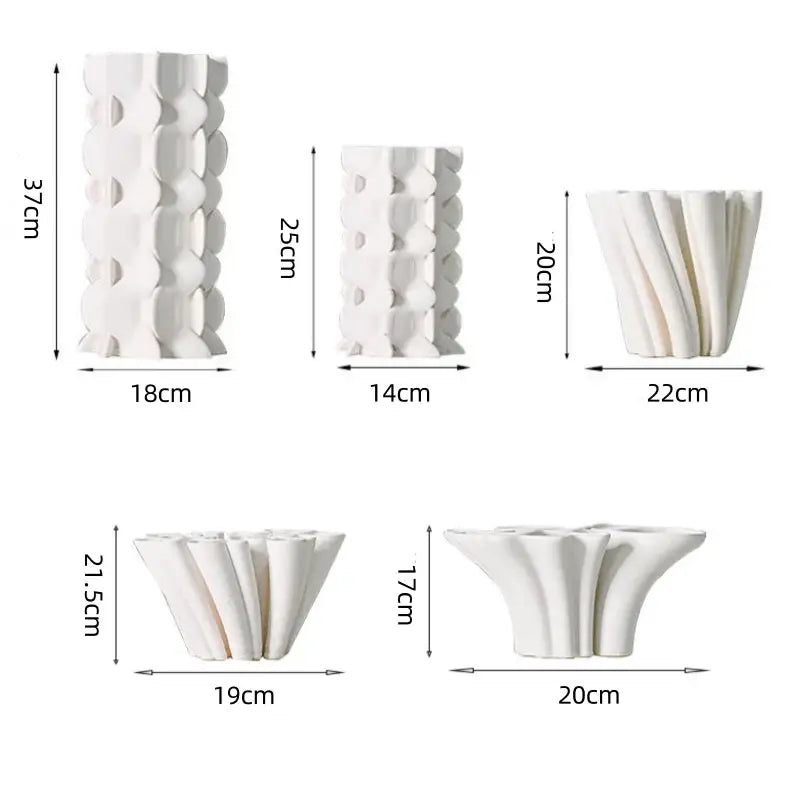 White geometric ceramic fold pattern vase set with textured surfaces in varying heights for living room decorbites geometric ceramic decor