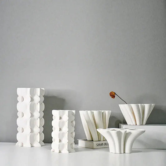 White geometric ceramic fold pattern vase with sculptural fluted design for living room decorbites geometric ceramic decor