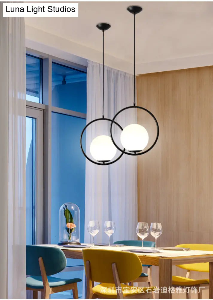 White Glass Pendant Light with Mid-Century Globe Design and Metal Ring