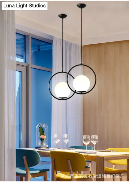 White Glass Pendant Light with Mid-Century Globe Design and Metal Ring