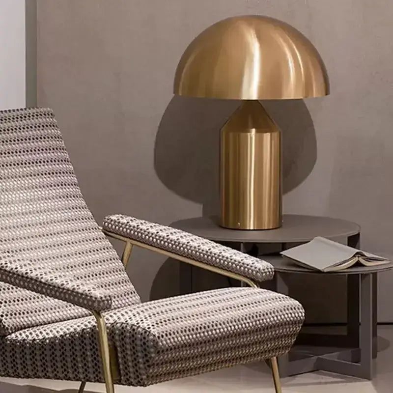 Golden glossy mushroom iron table lamp with sleek metallic finish for bedroom decor by decorbites iron table