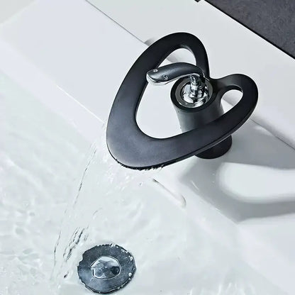 Black matte-finish snake-shaped basin faucet with polished chrome spout and handle for decorbites golden white bathroom sink
