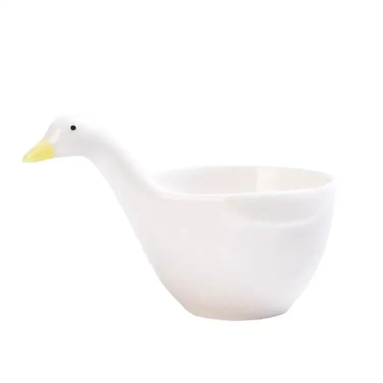 White goose ceramic snack bowl shaped like a duck with yellow beak and black eye for kitchen sauce use