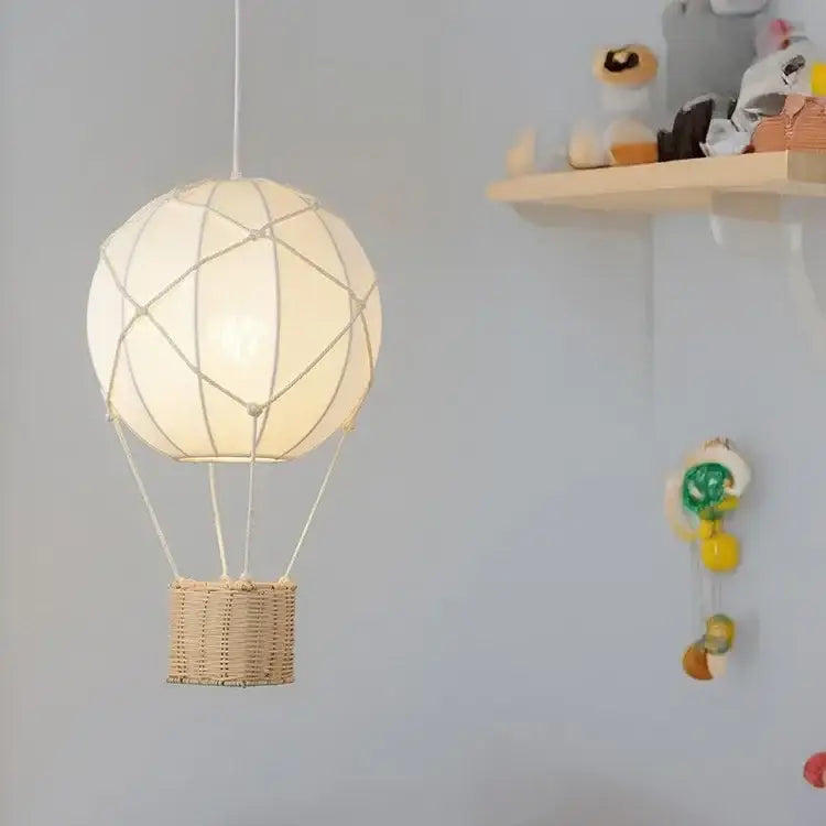 White hot air balloon chandelier with cream wicker basket and rope detailing for kids room decorbites hot air balloon
