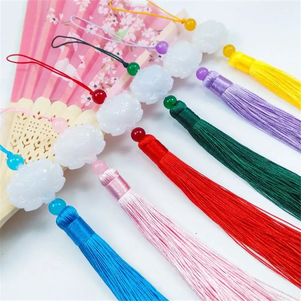 White jade lotus decorative pendant with cloud-shaped charms and colorful silk tassels for living room decor