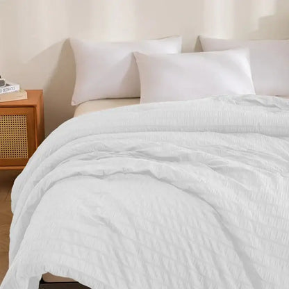 White king size seersucker quilt with textured soft crinkled surface by decorbites for all season comfort