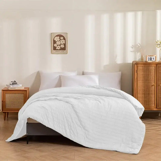 White king size seersucker quilt comforter with soft plush texture and subtle vertical stitching decorbites king size