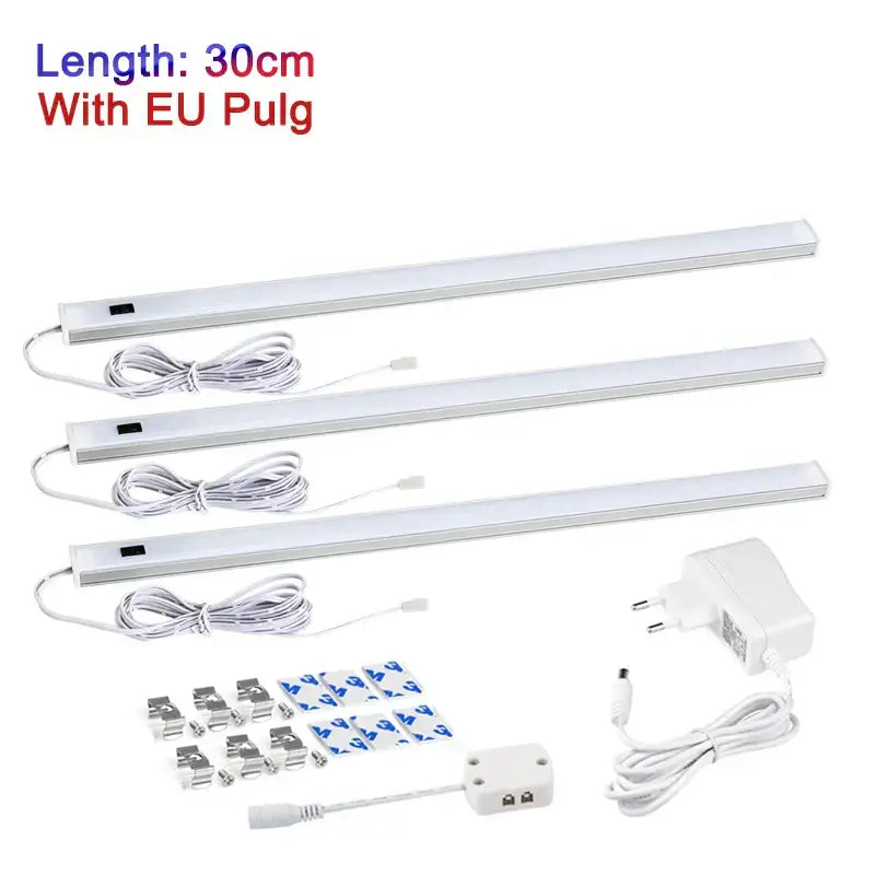 Three white 30cm led strip cabinet lights with pir motion sensor eu plug and mounting hardware for under counter use