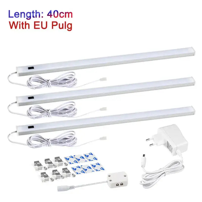 Set of three 40cm white led motion sensor cabinet lights with eu plug adhesive strips and mounting hardware