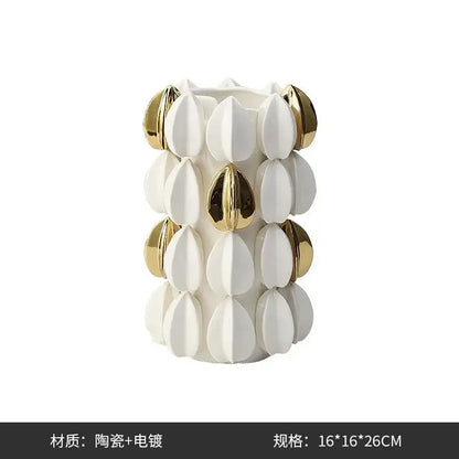 White ceramic vase with gold-toned petal accents in a lemon carambola design for living room decor