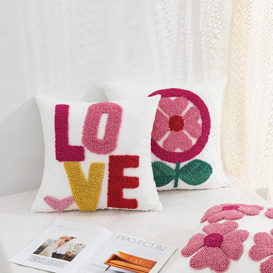 White love floral decorative sofa pillowcase with fluffy pink red yellow yarn letters and vibrant pink green design decorbites decorative