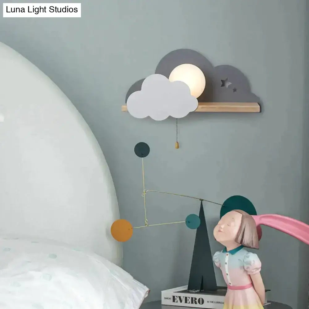 White macaron led cloud wall lamp with illuminated moon and gray stars on light wood shelf for children bedroom