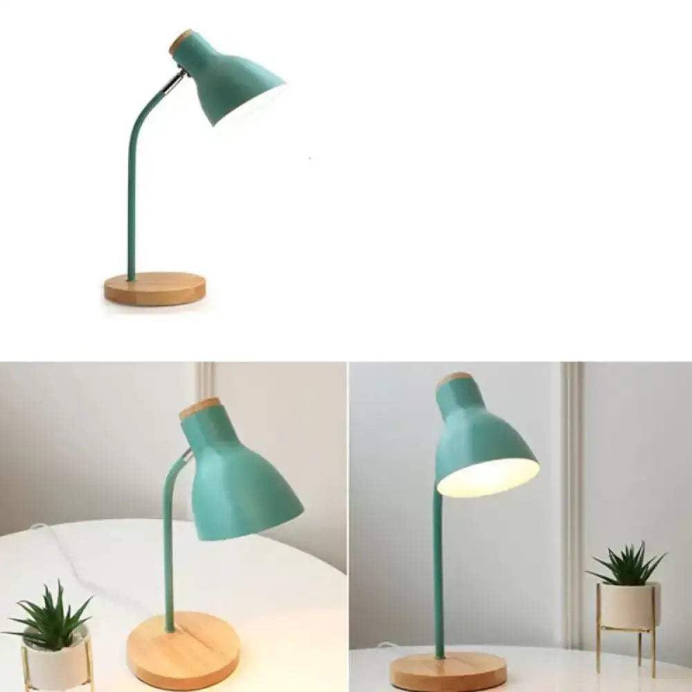 Teal macaron metal table light with wooden circular base and adjustable gooseneck arm for bedroom use