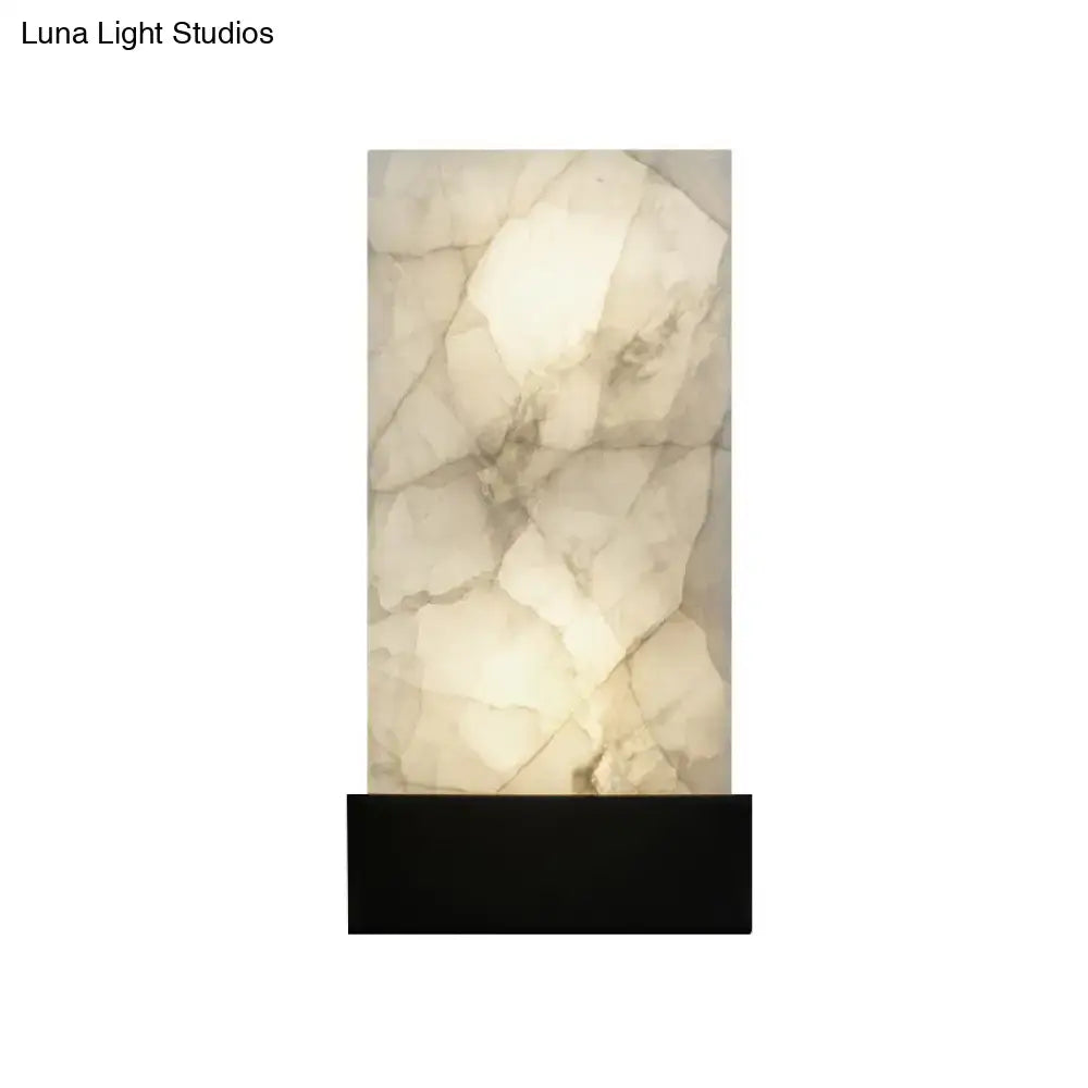 A sleek rectangular onyx wall sconce with glowing white interior and gray veining for e26 e27 light use