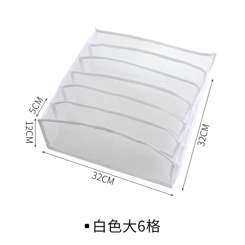 White translucent mesh organizer box set with six compartments for underwear storage in bedroom wardrobe