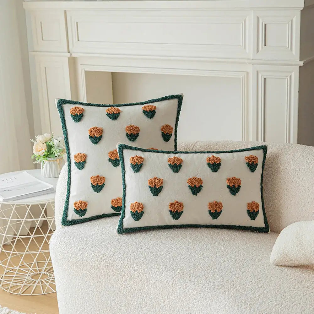White rectangular pillow cover with green and orange tufted cactus embroidery and plush textured surface for living room decorbites decor