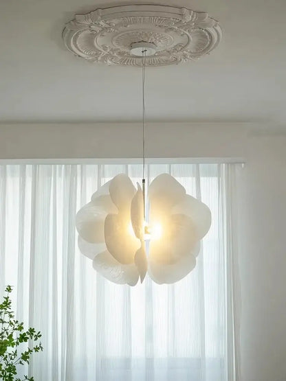 White paper flower butterfly pendant light with layered petals and warm glow ideal for elegant bedroom decorbites pendant light