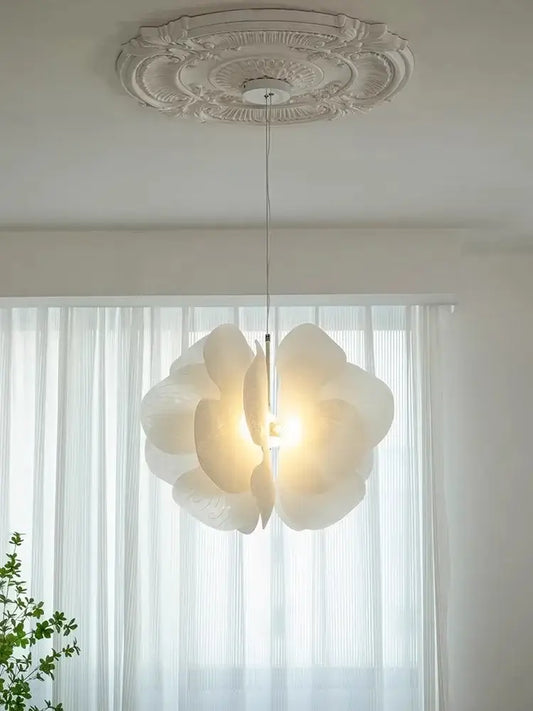 White paper flower butterfly pendant light with layered petals and warm glow ideal for elegant bedroom decorbites pendant light