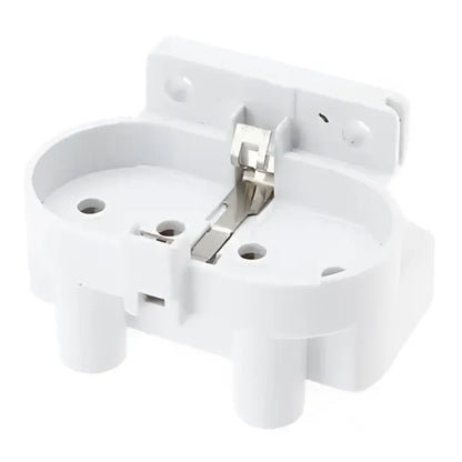 White plastic 2g11 lamp holder socket with metallic contacts for electrical connection in kitchen terminal block