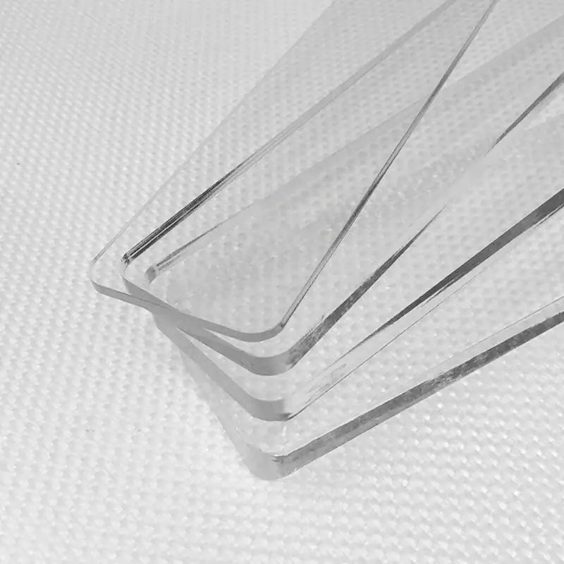White plastic biscuit cake rolling tool featuring clear acrylic sheets with smooth rounded edges for biscuit cake rolling