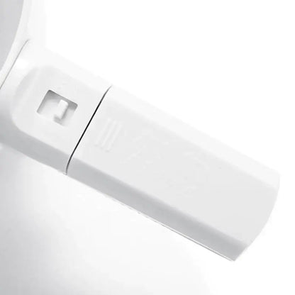 White plastic electric flour sifter shaker with rectangular usb flash drive style body and square cutout side detail