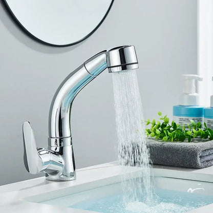 Chrome-finished single-handle bathroom sink faucet with sleek curved spout and pull-down spray head for bathroom sink use