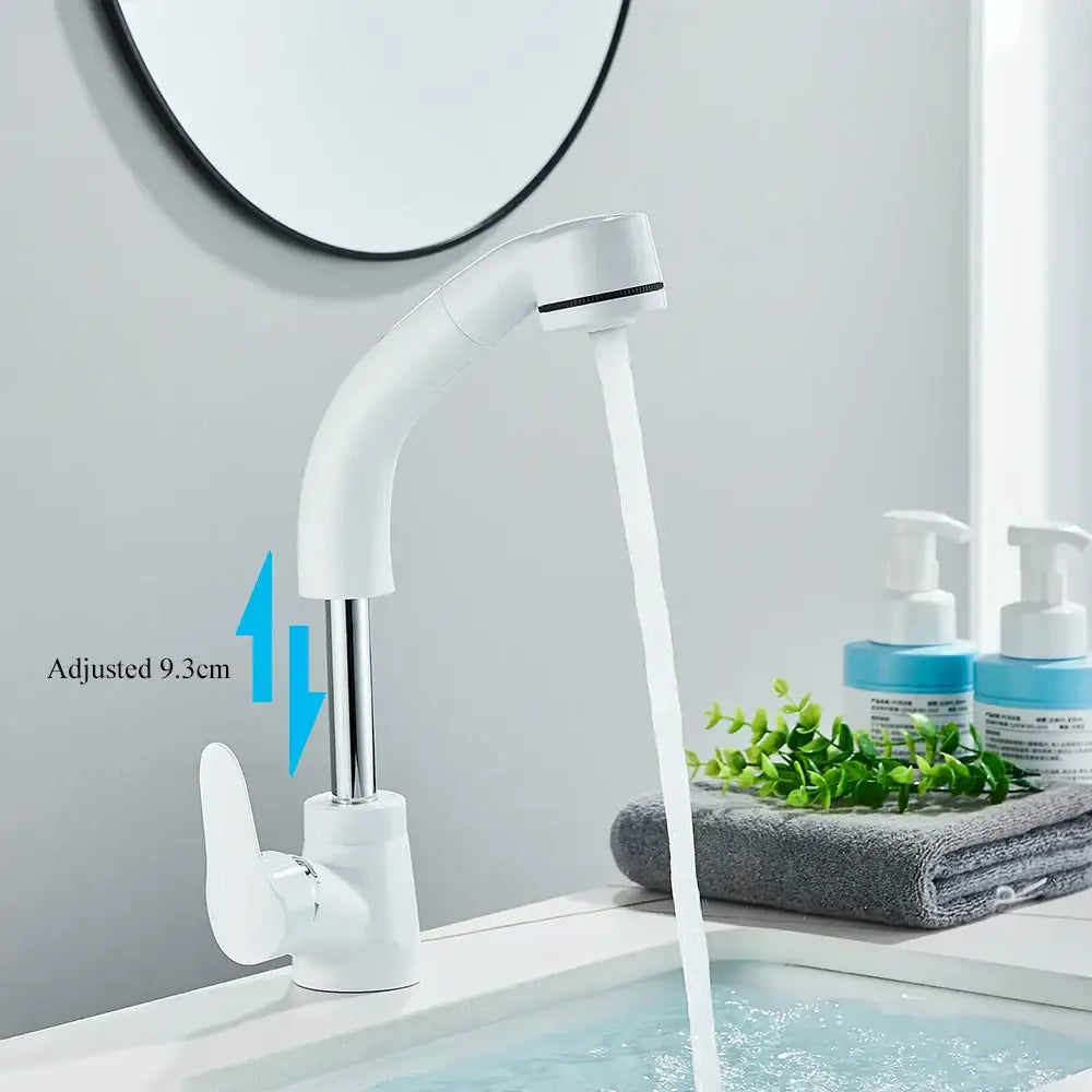 White plastic kitchen sink faucet with curved and adjustable spout featuring chrome accents for bathroom sink use