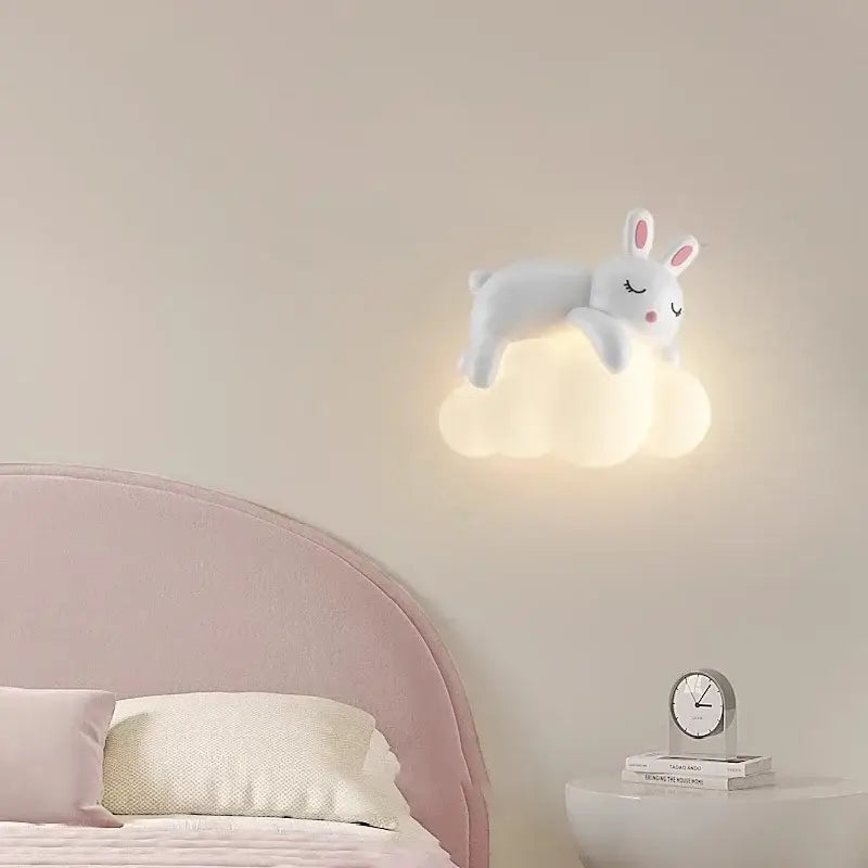 White polar bear led wall lamp shaped like a soft bunny with pink ears on a warm glowing cloud base for childrens bedroom