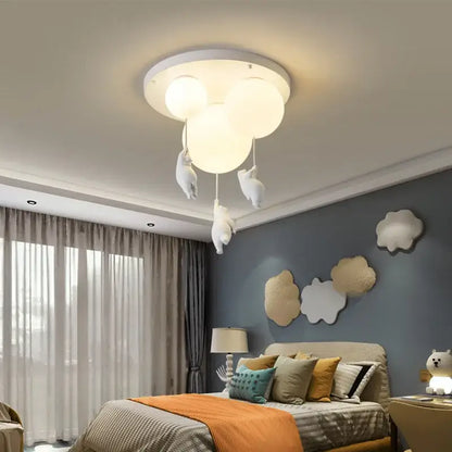 White cloud-shaped resin pendant light with dangling bear figurines for childrens room lighting