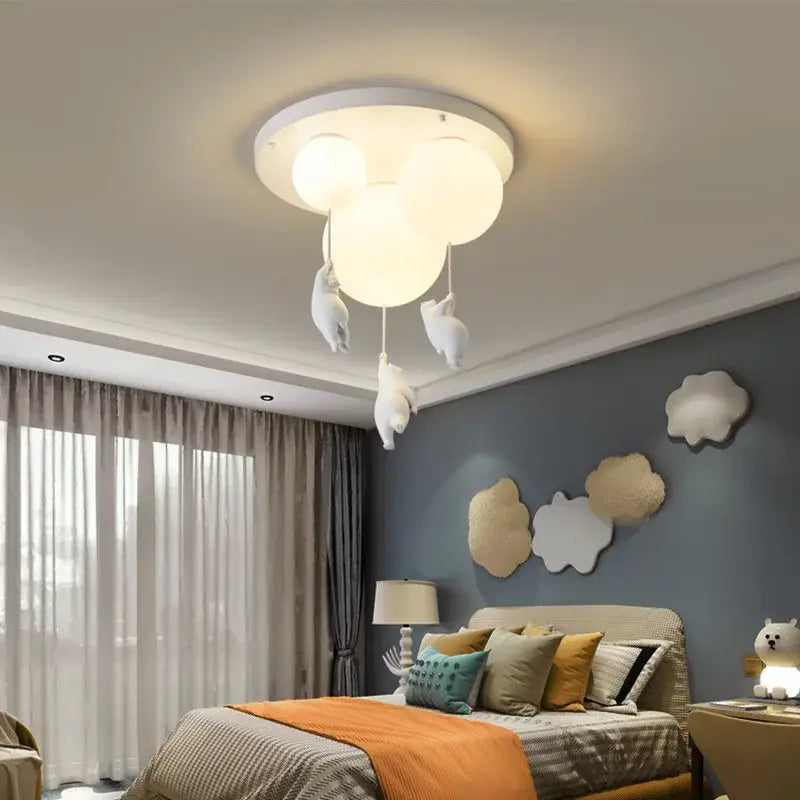 White cloud-shaped resin pendant light with dangling bear figurines for childrens room lighting