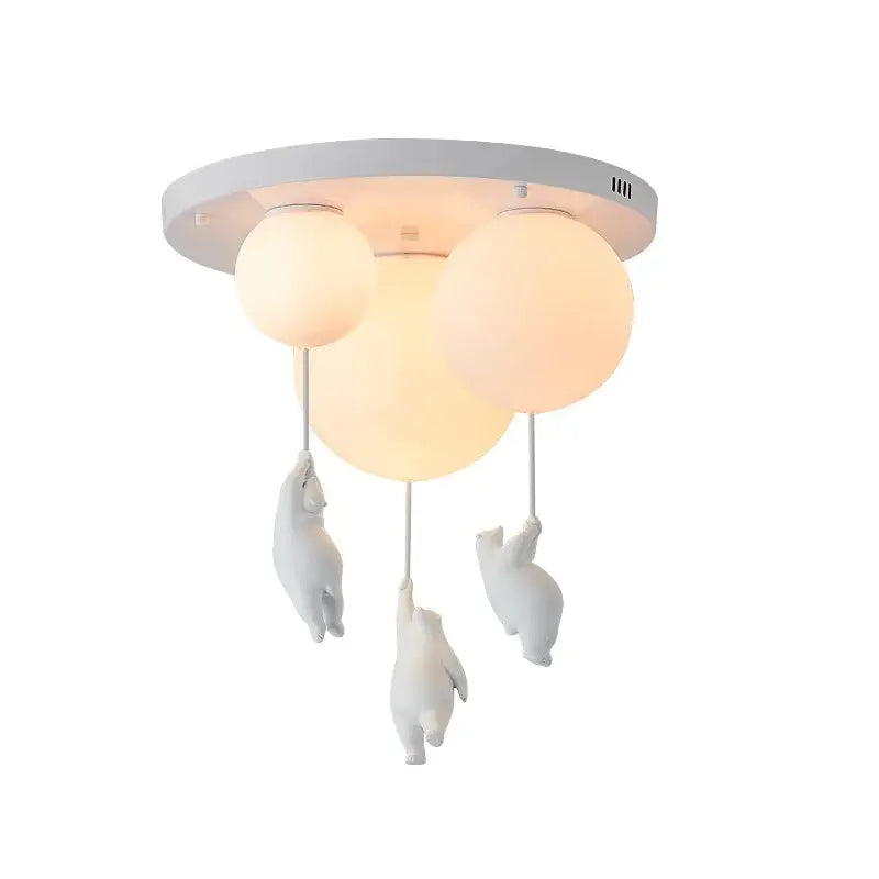 White polar bear resin pendant light with three frosted glass shades and sculpted bears for childrens room lighting