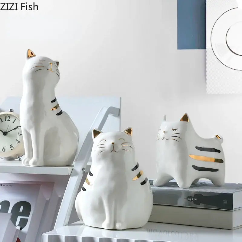White porcelain cat vase with gold trim featuring ceramic cat figurines and striped accents for decorbites cat vase decor