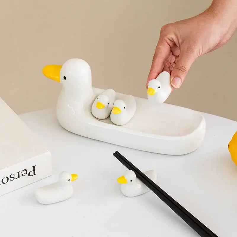 White porcelain duck chopstick holder tray with yellow beaks and black eyes ceramic dish for dining room use