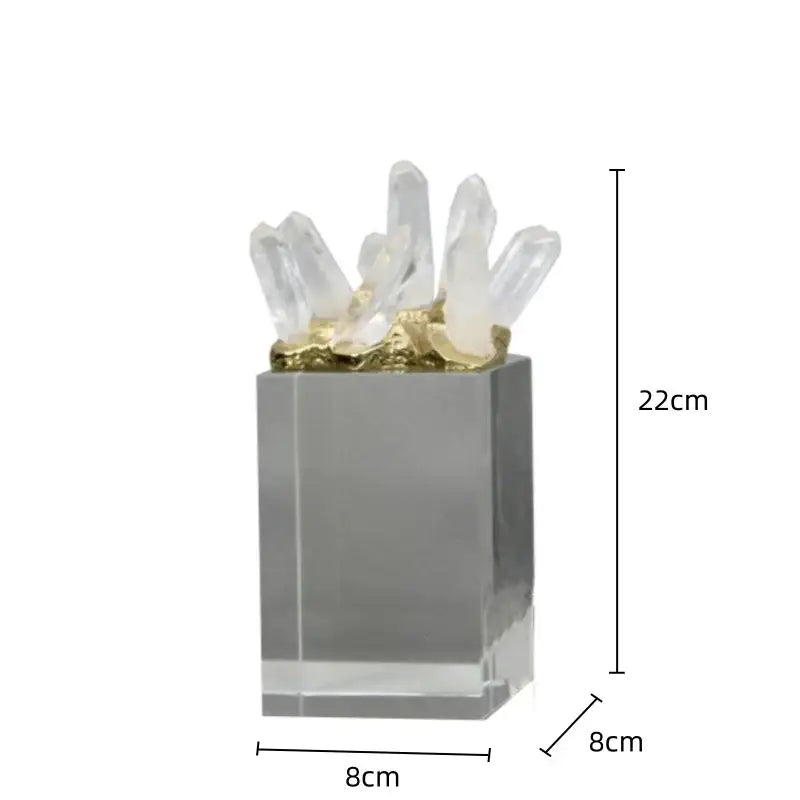 White quartz crystal stone marble ornament with clear quartz cluster and gold-toned base on acrylic pedestal