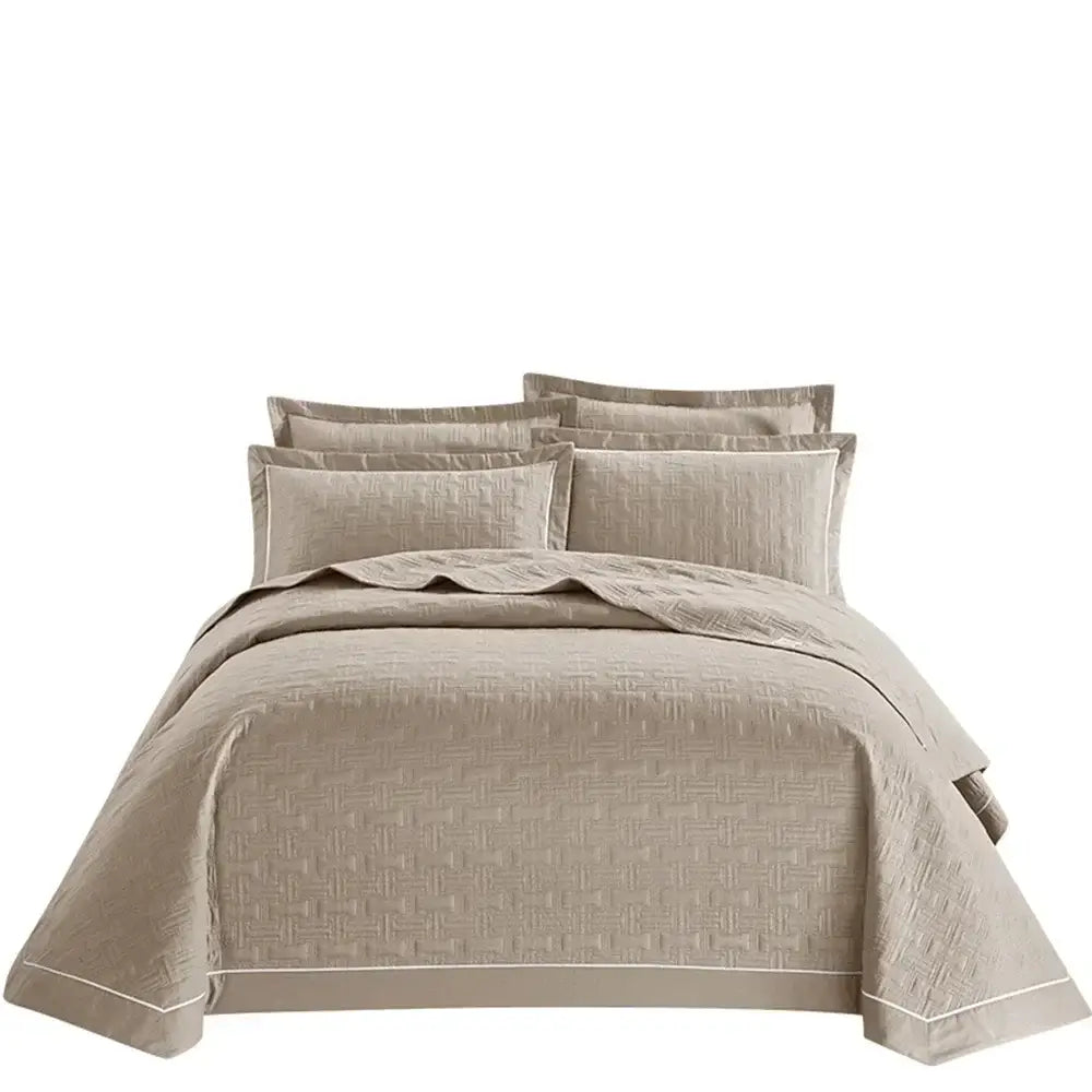 Beige quilted cotton coverlet bedspread set with subtle woven texture and matching pillow shams for decorbites bedroom decor