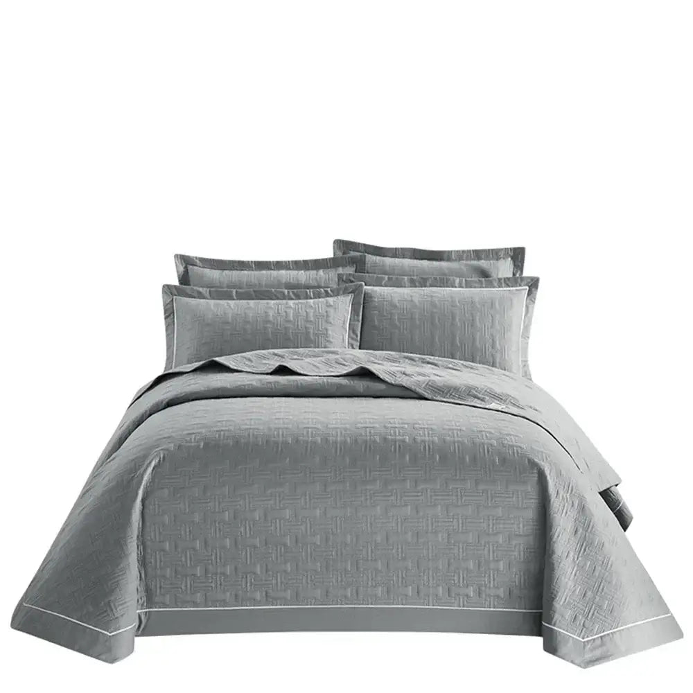 Gray quilted cotton coverlet bedspread set with subtle woven pattern and white piping for decorbites bedroom decor