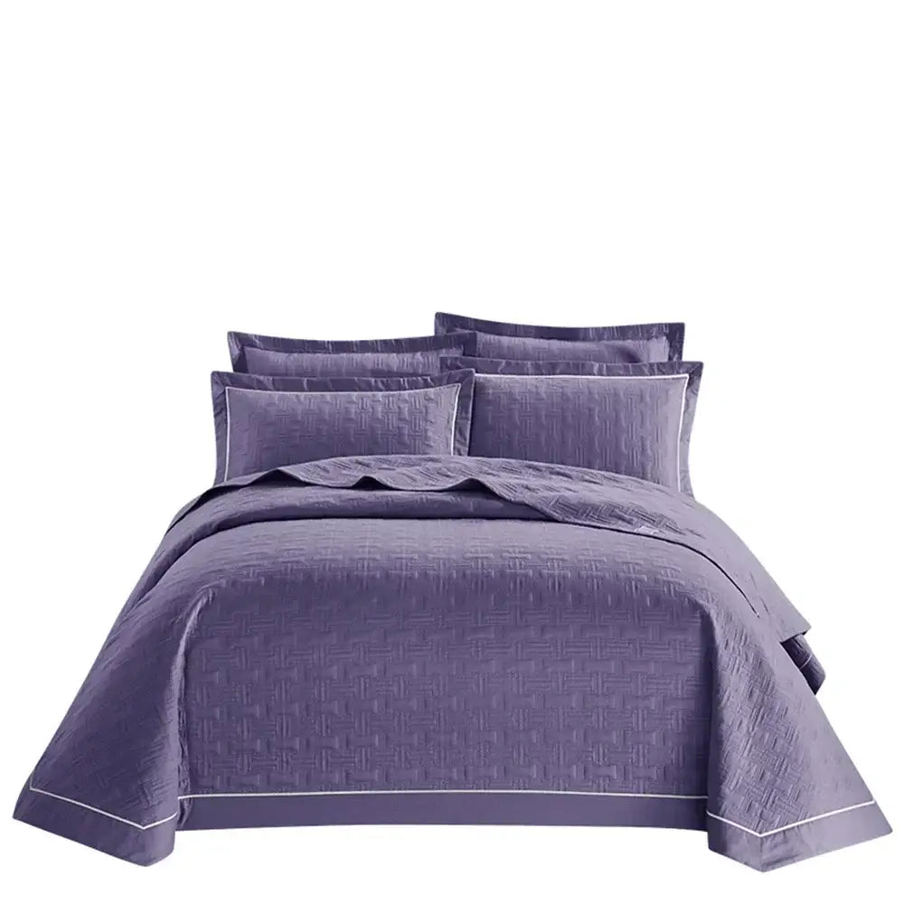 Purple quilted cotton coverlet bedspread set with subtle geometric pattern and white piping trim for bedroom decorbites decor