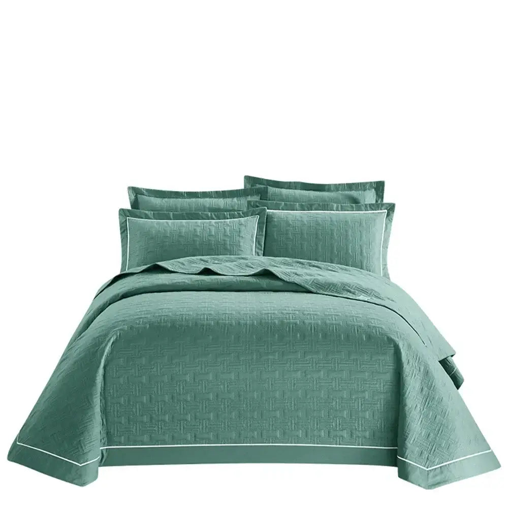 Teal quilted cotton coverlet bedspread set with subtle woven texture and white piping for bedroom decorbites decor