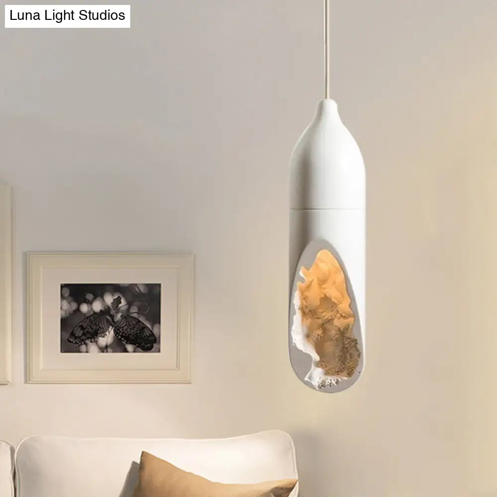 White Resin Farmhouse Pendant Light with Unique Pill Shape and Hollow-out Design