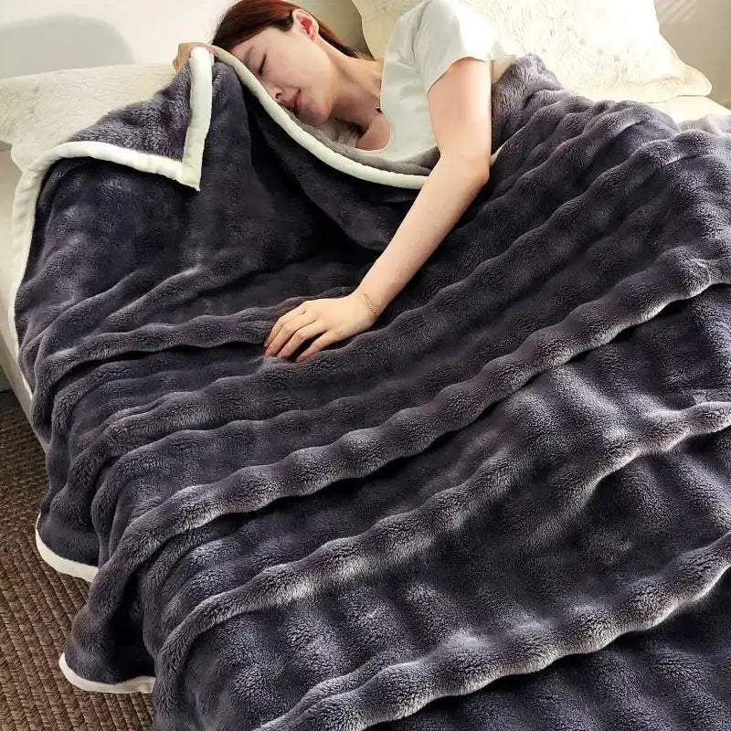 Plush dark gray decorbites bubble velvet blanket with soft white inner lining and ribbed texture for bedroom decor
