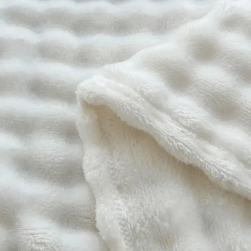 White ribbed bubble velvet blanket with soft textured surface and subtle raised dots from decorbites bubble velvet collection