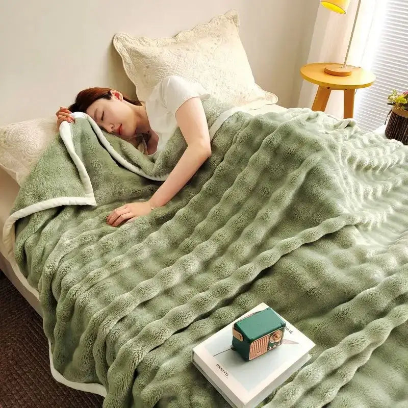 Soft moss green decorbites bubble velvet blanket with white fleece border and textured wavy pattern for cozy decor