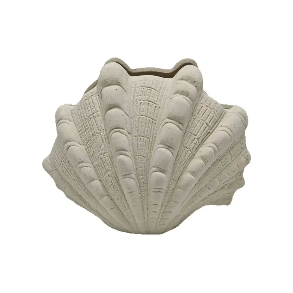 Beige ceramic clam shell vase with ridged texture and scalloped edges ideal for decorbites ceramic clam living room decor