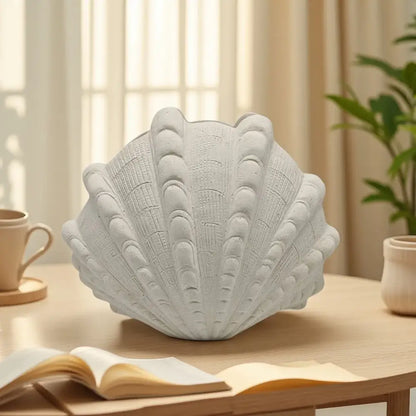 White ridged ceramic clam shell vase with intricate textured detailing for living room decor by decorbites ceramic clam